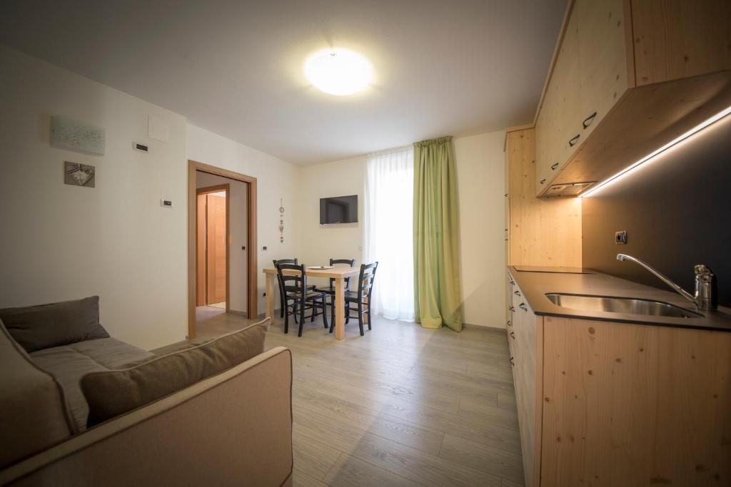 Kuchyň nebo kuchyňský kout v ubytování Aparthotel Dolomites Living&Relax