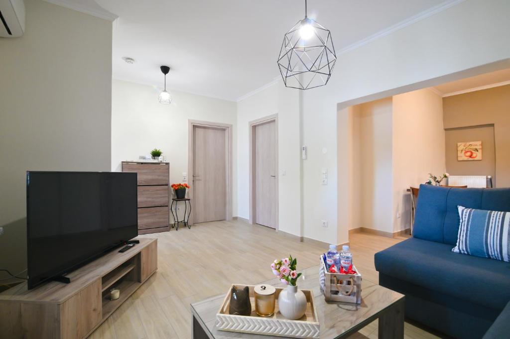 TV a/nebo společenská místnost v ubytování Filios Apartment