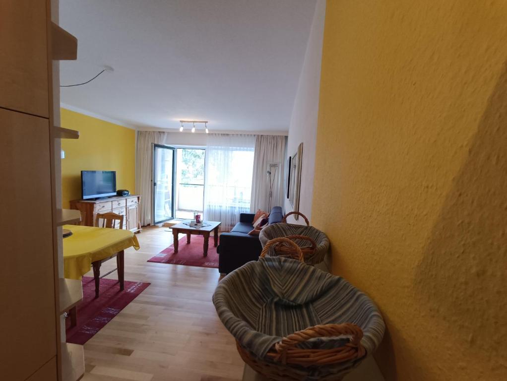TV a/nebo společenská místnost v ubytování Strandleben 1