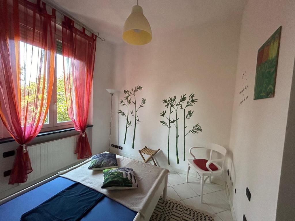 Katil atau katil-katil dalam bilik di Appartamento incantevole a Parma