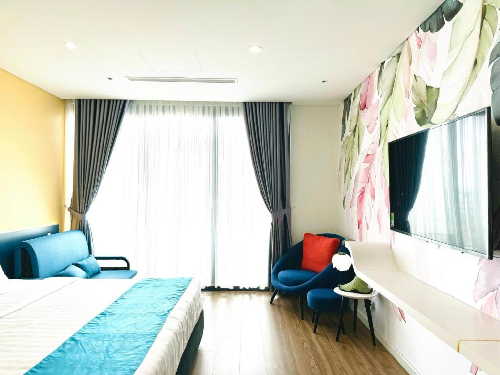 Postel nebo postele na pokoji v ubytování Hải Tiến - Thanh Hóa