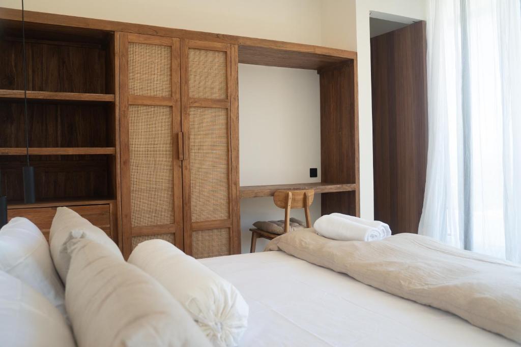 Postel nebo postele na pokoji v ubytování Yemaya Villas
