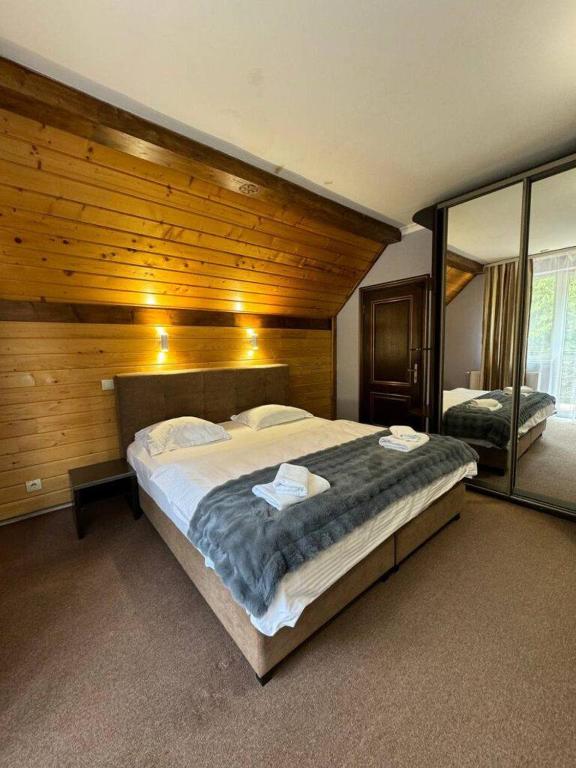 Postel nebo postele na pokoji v ubytování Wellland Hotel