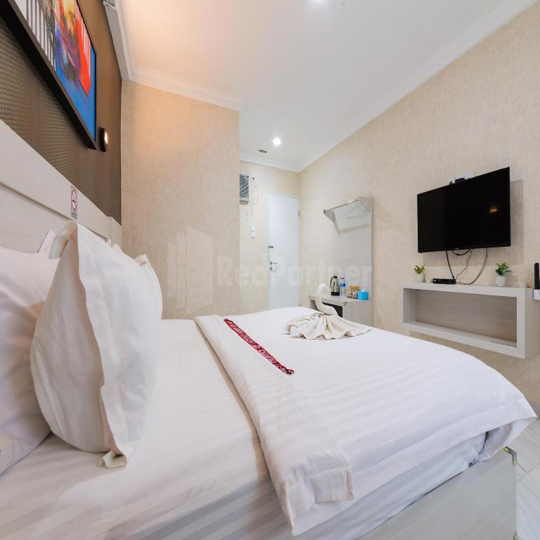 TV a/nebo společenská místnost v ubytování Hotel 78 Parapat Mitra RedDoorz