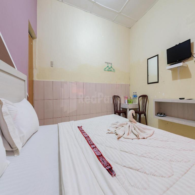 TV a/nebo společenská místnost v ubytování Hotel 78 Parapat Mitra RedDoorz