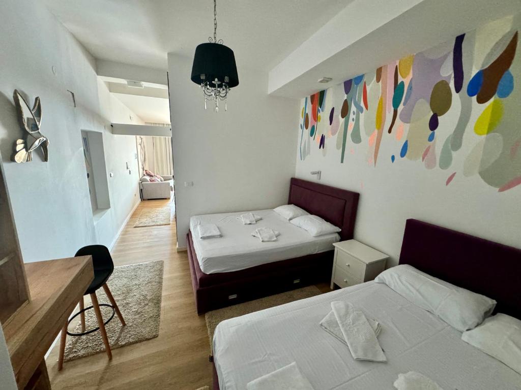 Postel nebo postele na pokoji v ubytování Apartments Lungo Mare