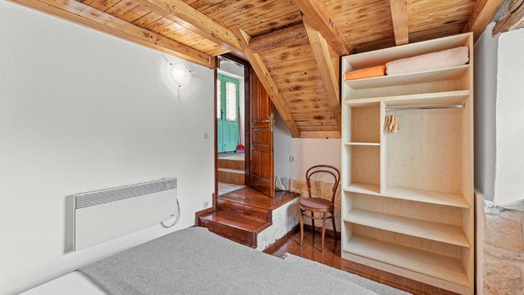 Łóżko lub łóżka w pokoju w obiekcie Casa Corona
