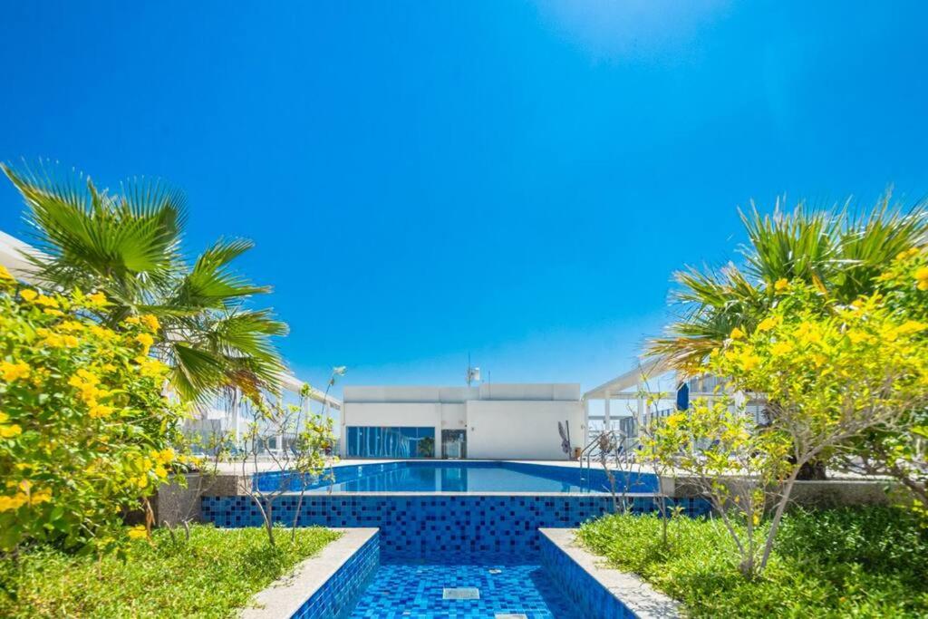 Bazén v ubytování Seaside Serenity Apartment nebo v jeho okolí