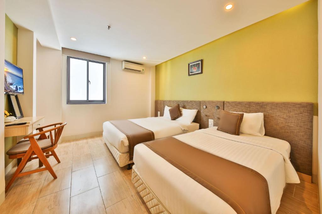 Giường trong phòng chung tại Daisy Flower Nha Trang