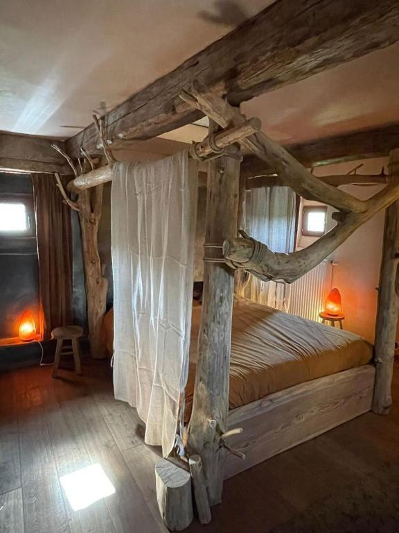 Postel nebo postele na pokoji v ubytování B&B Le Manoir d'Ange