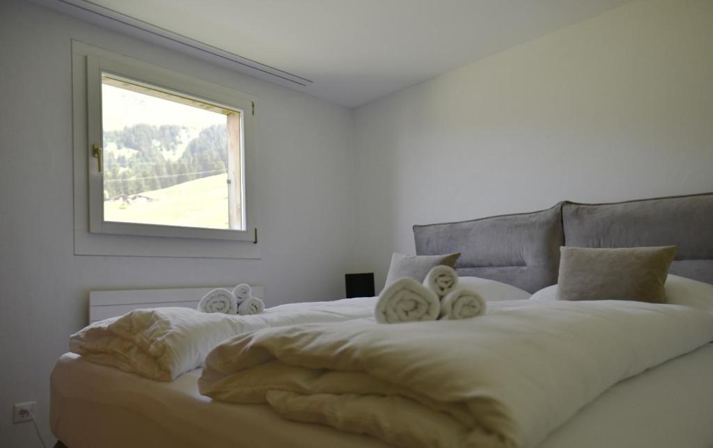 Postel nebo postele na pokoji v ubytování Wohnung am Heimberg