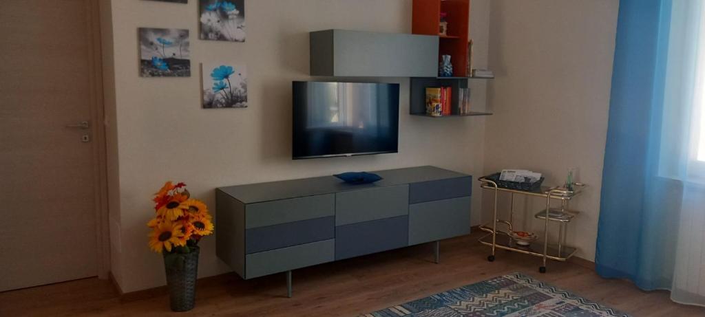 TV a/nebo společenská místnost v ubytování Il portico