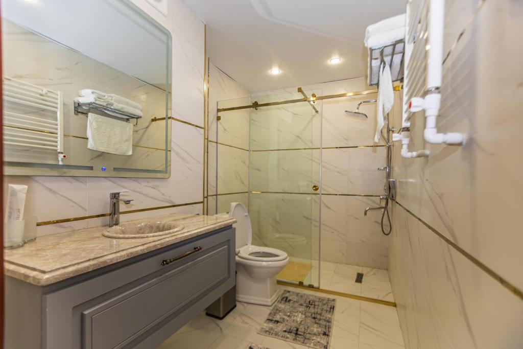 Koupelna v ubytování Firdavsi Hotel