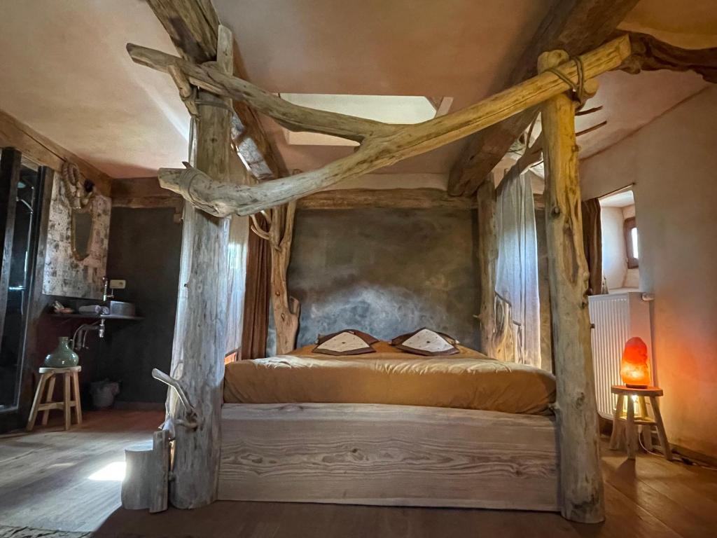 Postel nebo postele na pokoji v ubytování B&B Le Manoir d'Ange