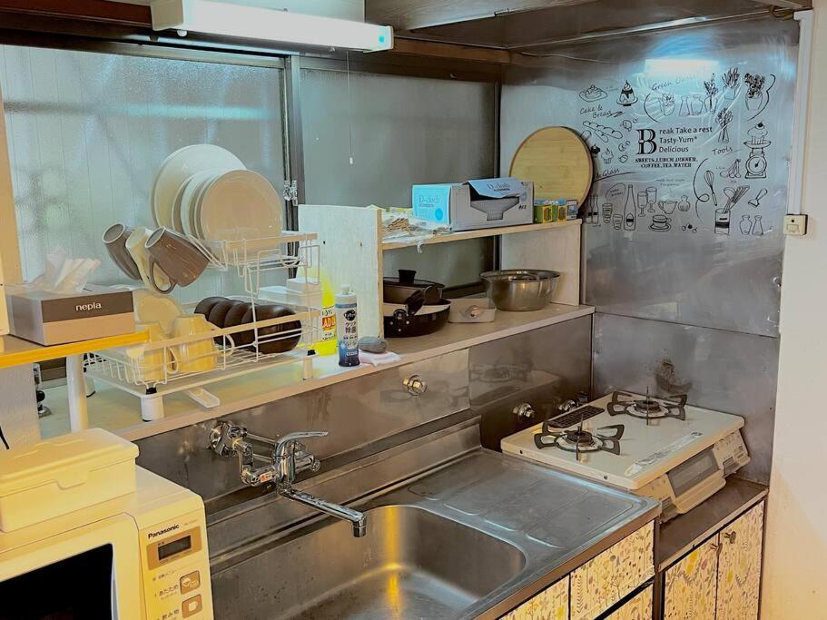 Nhà bếp/bếp nhỏ tại 2階建1棟貸しの寝室4部屋 無料高速Wi-Fi