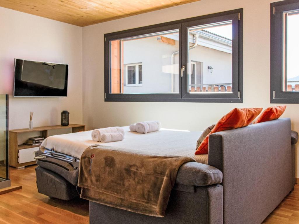 Postel nebo postele na pokoji v ubytování Chalet Le Raccard by Interhome