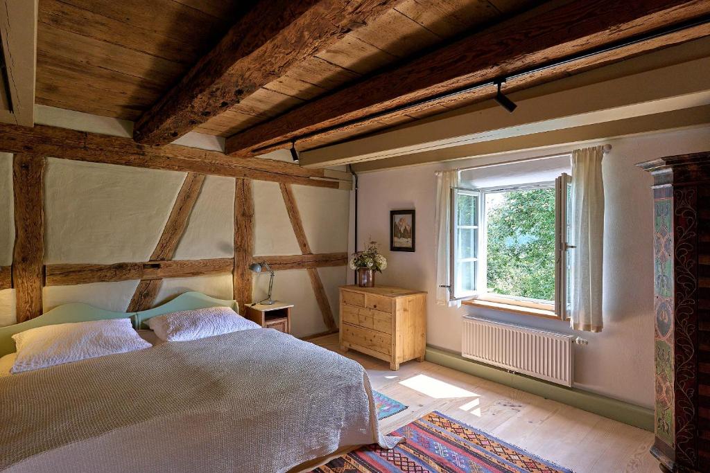 Postel nebo postele na pokoji v ubytování Hof Spittelsberg
