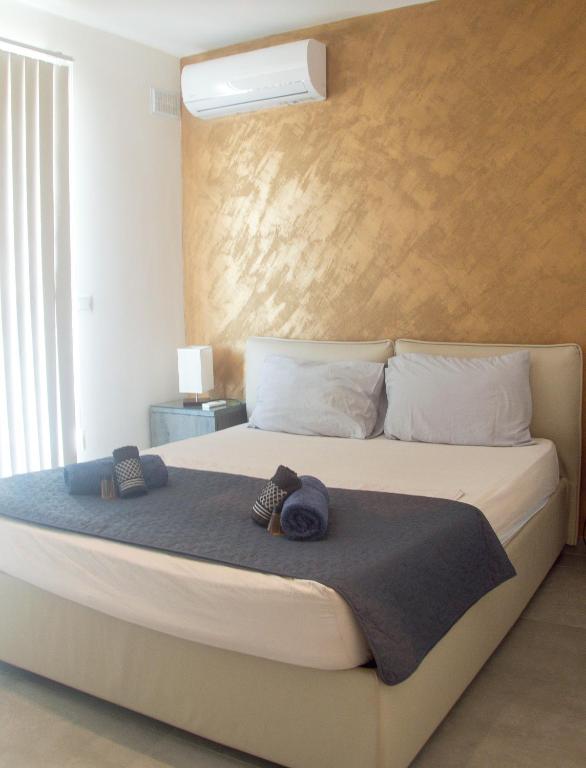 Postel nebo postele na pokoji v ubytování Marsaskala Sea View Duplex Penthouse - Mive Properties