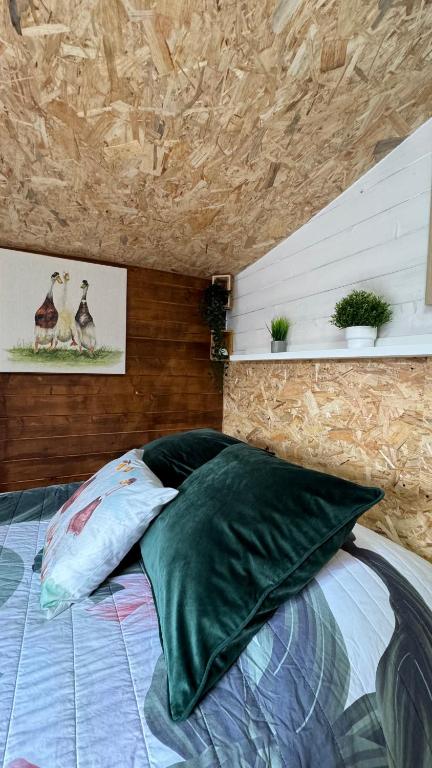 Postel nebo postele na pokoji v ubytování Le chalet des 3 canards