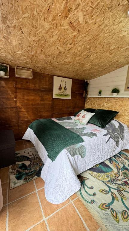 Postel nebo postele na pokoji v ubytování Le chalet des 3 canards