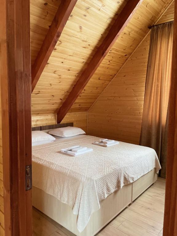 Postel nebo postele na pokoji v ubytování Forest Side Gogolati
