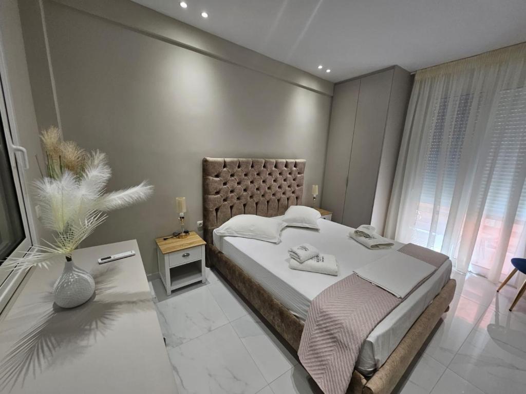 Ένα ή περισσότερα κρεβάτια σε δωμάτιο στο Agora luxury Flat 3