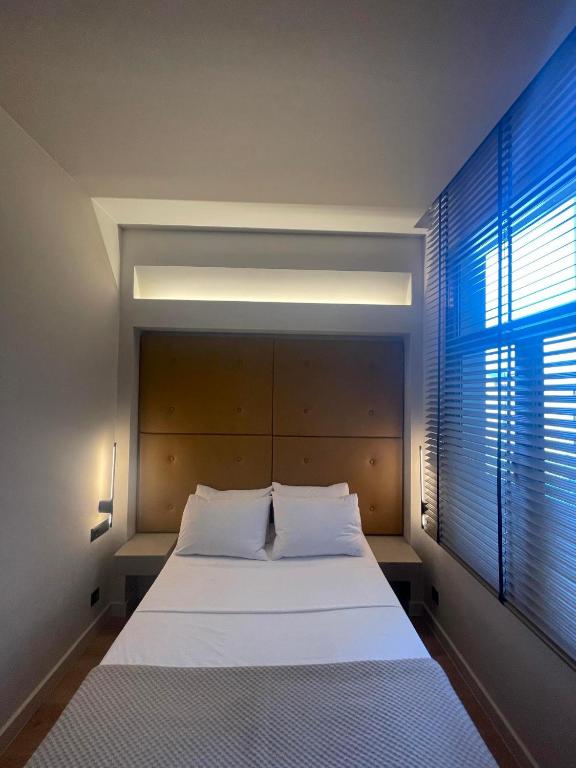 Posteľ alebo postele v izbe v ubytovaní Palladion Boutique Hotel