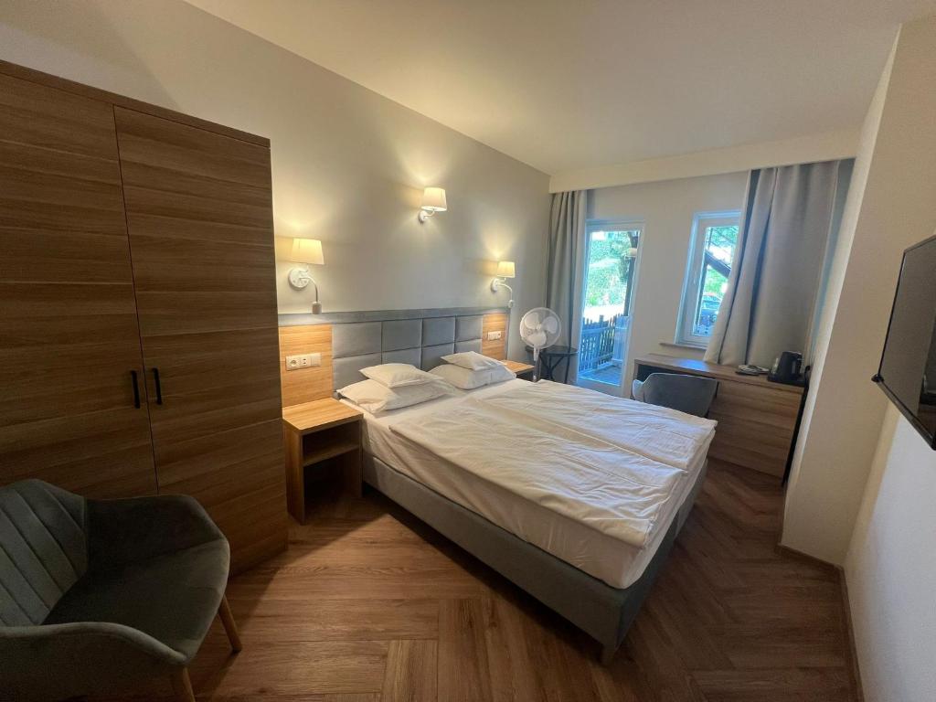 Ένα ή περισσότερα κρεβάτια σε δωμάτιο στο Villa Kahlberg