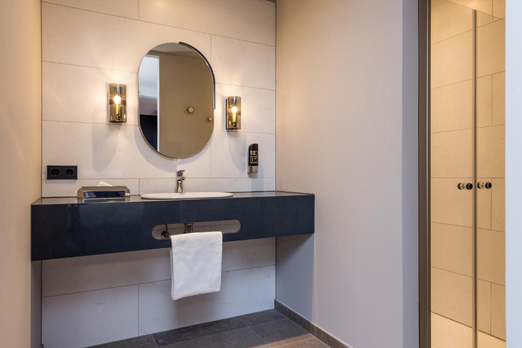 Koupelna v ubytování MERICI Hotel Sittard