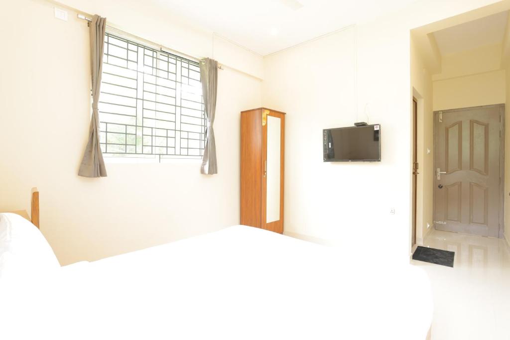 Postel nebo postele na pokoji v ubytování Luxe Vue Appartment