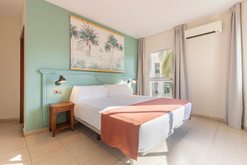 Säng eller sängar i ett rum på Moon Dreams Fuengirola