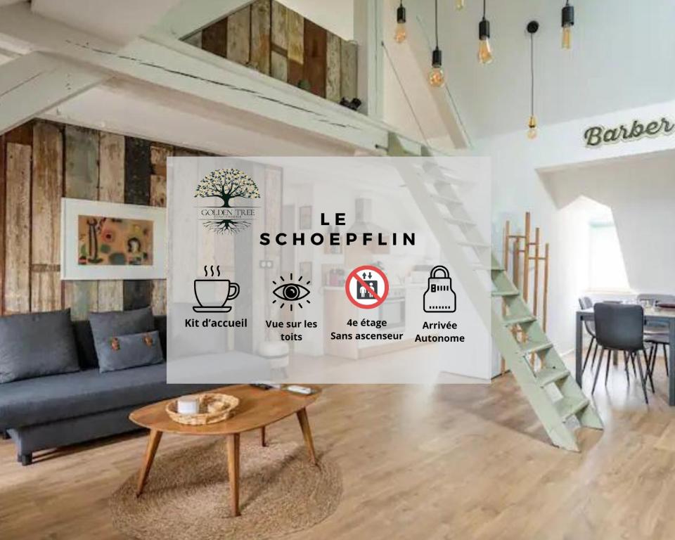 un salon avec un canapé bleu et une table dans l'établissement Le Schoepflin - Coeur de Strasbourg - Vue toits, à Strasbourg