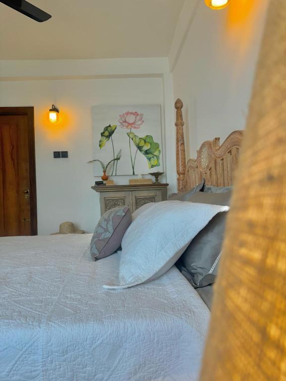 Postel nebo postele na pokoji v ubytování Villa Vikasa Colombo