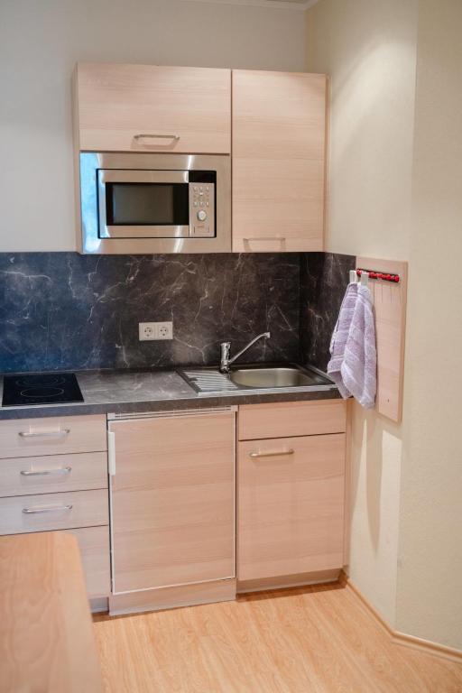 Kuchyň nebo kuchyňský kout v ubytování Apartment Kirschbaum by Interhome