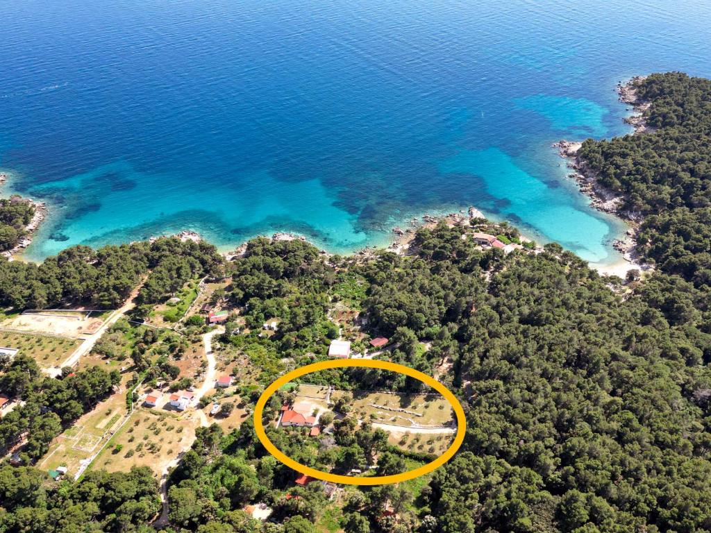 an aerial view of an island with a yellow circle at Holiday Home Dundo House by Interhome in Rab