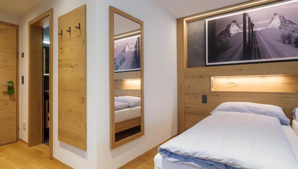 Postel nebo postele na pokoji v ubytování Hotel La Reserve