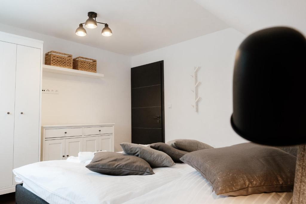 Postel nebo postele na pokoji v ubytování Apartmán Panorama