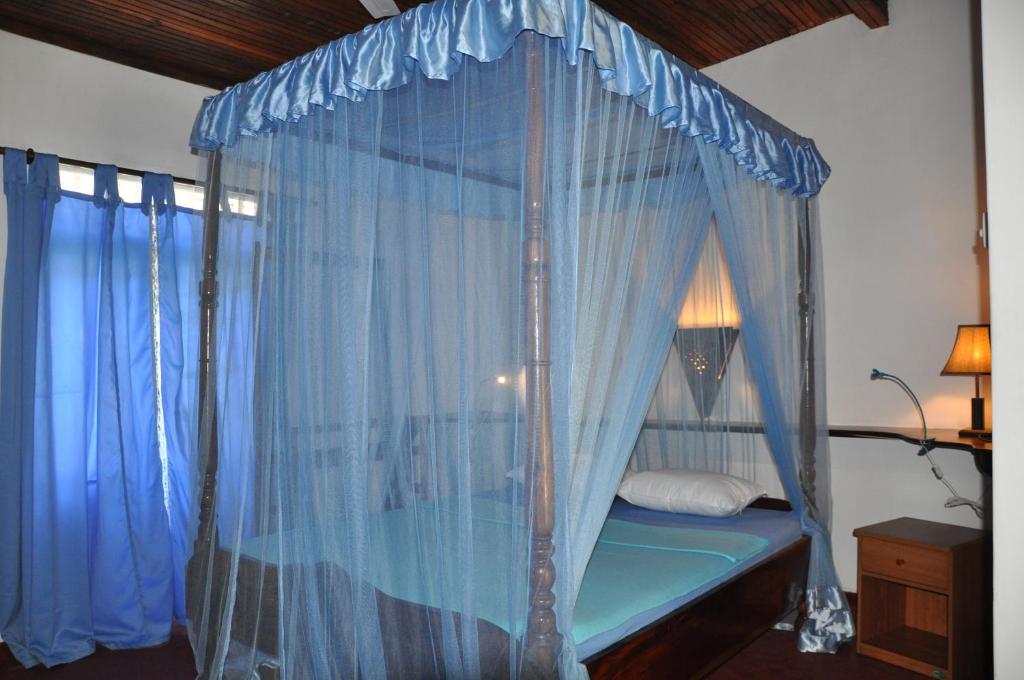 Postel nebo postele na pokoji v ubytování Gasthaus Langeoog