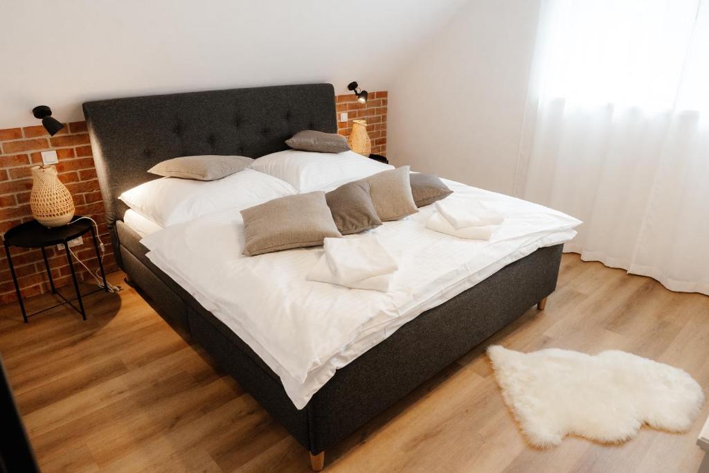 Postel nebo postele na pokoji v ubytování Apartmán Panorama