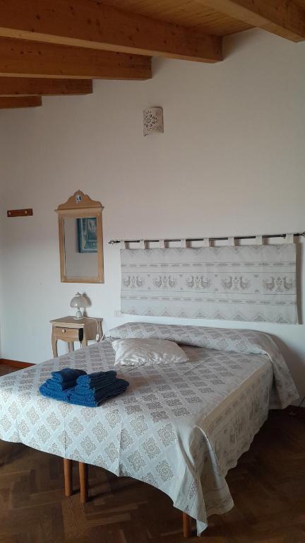 Postel nebo postele na pokoji v ubytování B&B Nuovo Capo Altano