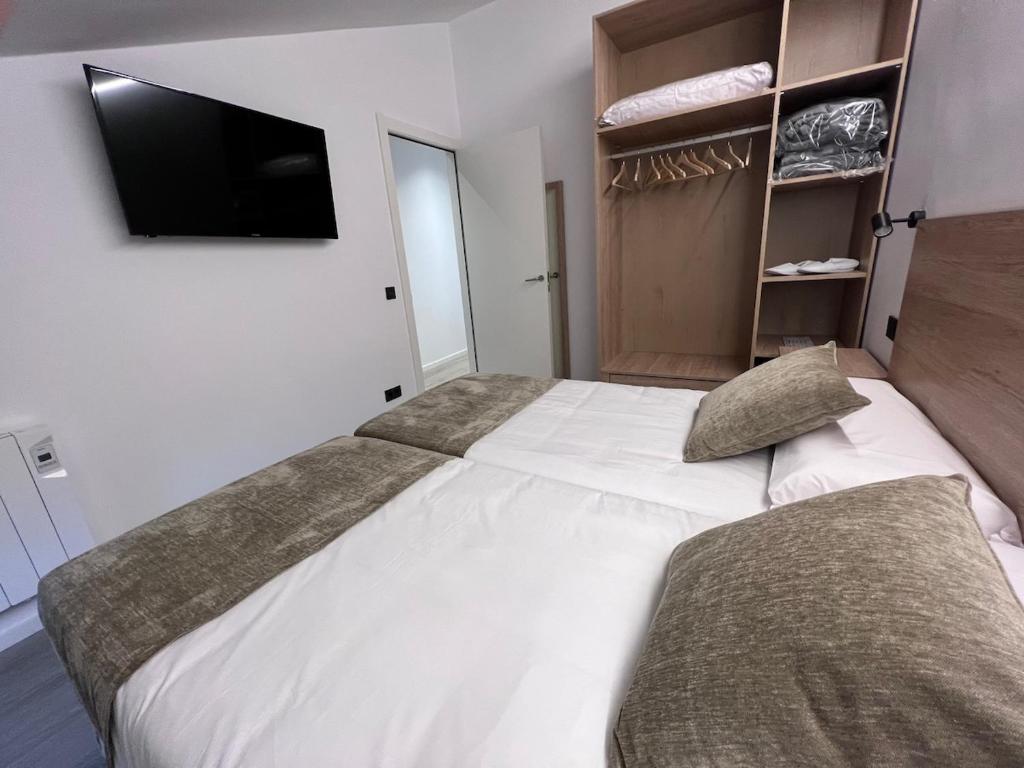 Postel nebo postele na pokoji v ubytování Apartaments Turistics El Buner