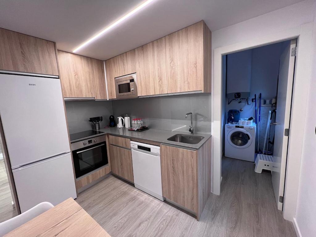 Kuchyň nebo kuchyňský kout v ubytování Apartaments Turistics El Buner