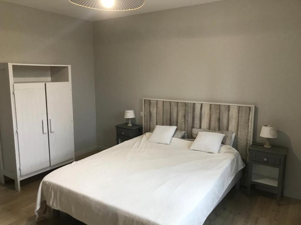 Postel nebo postele na pokoji v ubytování Gite Belle Echappée - Combe Laval