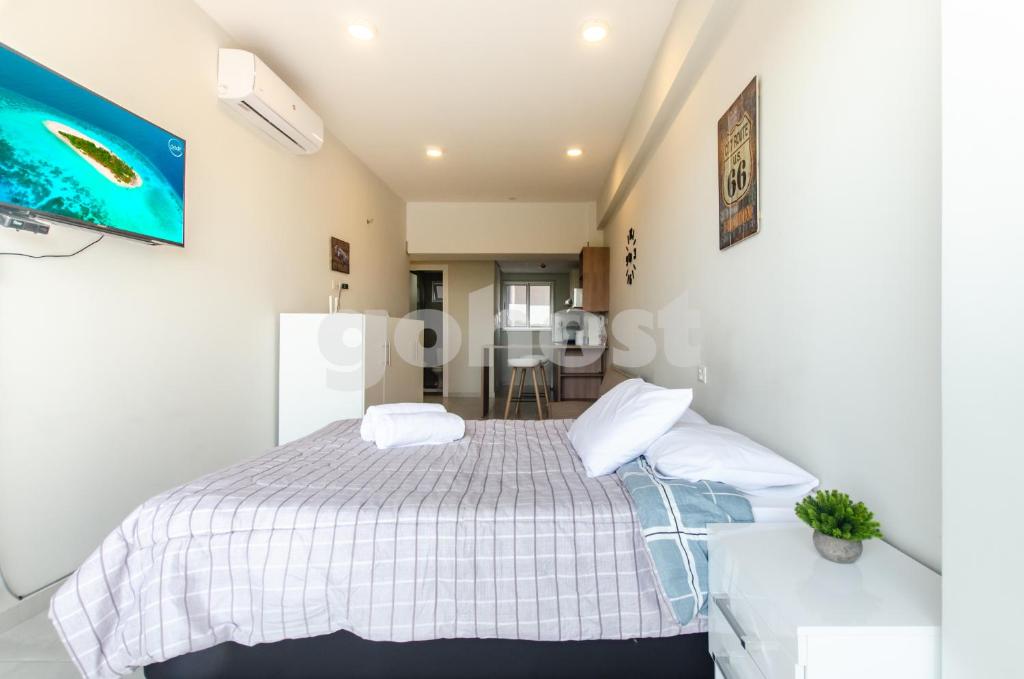 Postel nebo postele na pokoji v ubytování Comfortable Villa Morra Loft