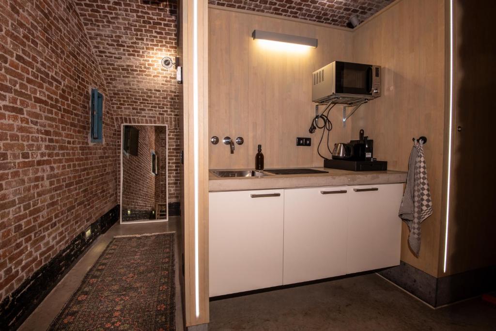 Kuchyň nebo kuchyňský kout v ubytování Fort Vuren