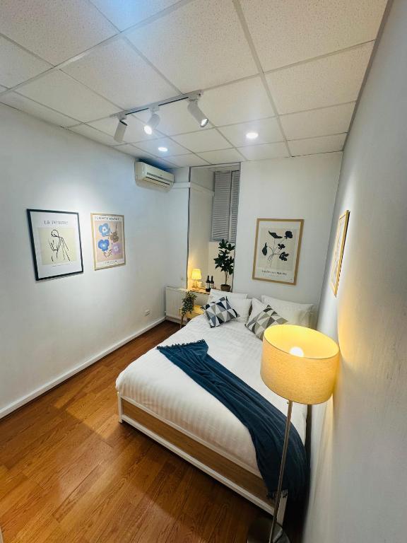 Postel nebo postele na pokoji v ubytování Cosy Koala Hostel