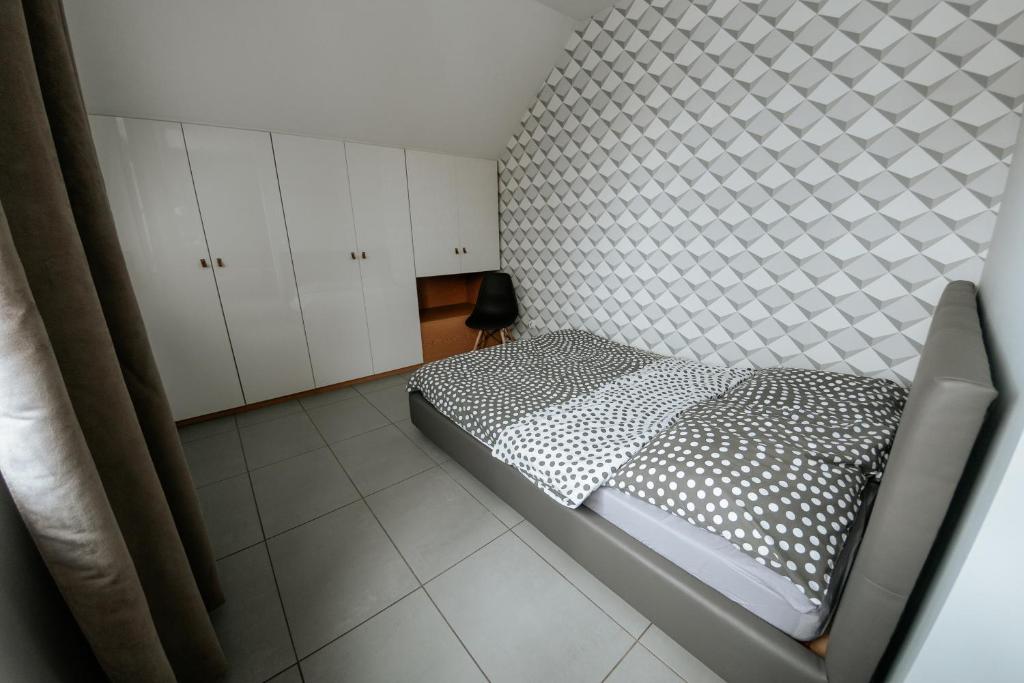 Postel nebo postele na pokoji v ubytování Apartamenty 66 c