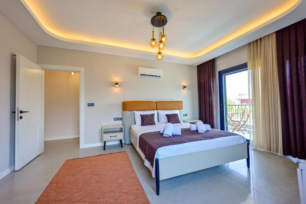 Postel nebo postele na pokoji v ubytování Villa Almilalin 6 bedroom Holiday Villa for Rent in Oludeniz