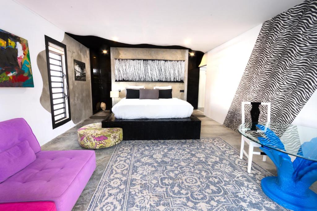 Postel nebo postele na pokoji v ubytování Thuishaven boutique mini-resort - no kids