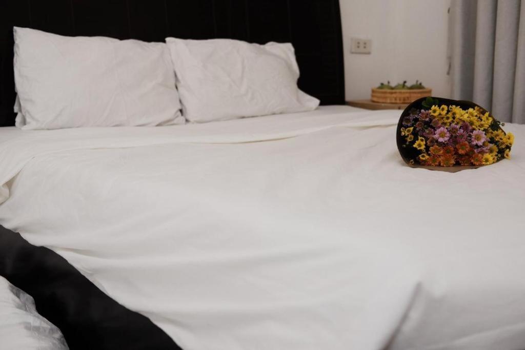 Postel nebo postele na pokoji v ubytování fortuna homestay